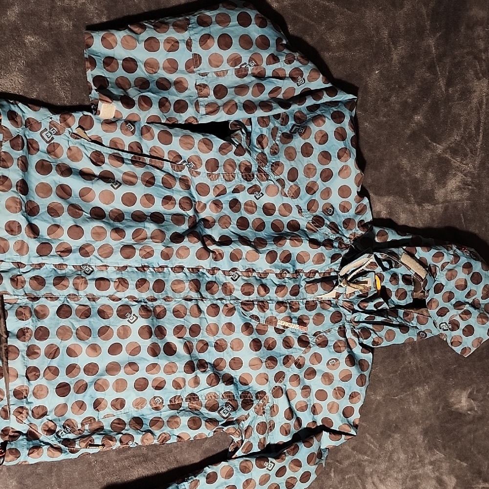 Didriksons Brown Polka Dot On Blue Background Rain Jacket With Detachable Hood.